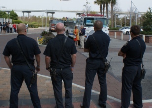Four Charleston Fire Department team members standing and observing the event
