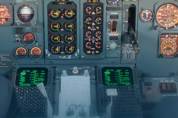 A view of the controls and instruments in an airplane's cockpit