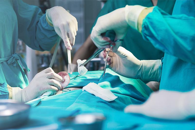 Doctor performing surgery
