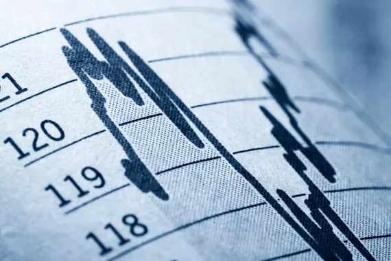 A close-up of a line graph picturing fluctuations. On the left side of the screen, a snippet of the y-axis shows 118 through 121. 