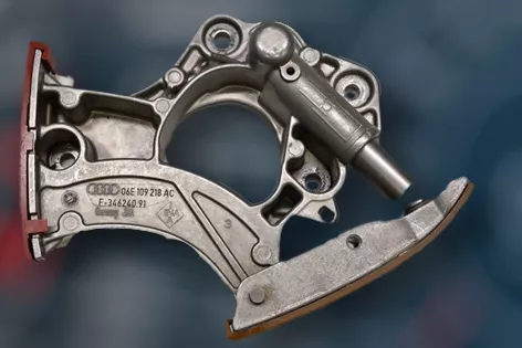 A timing chain tensioner