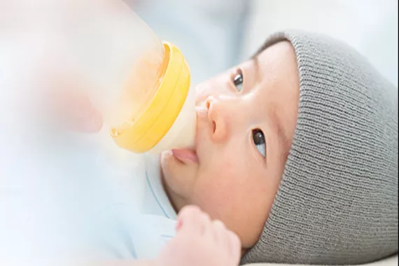 Baby drinking formula