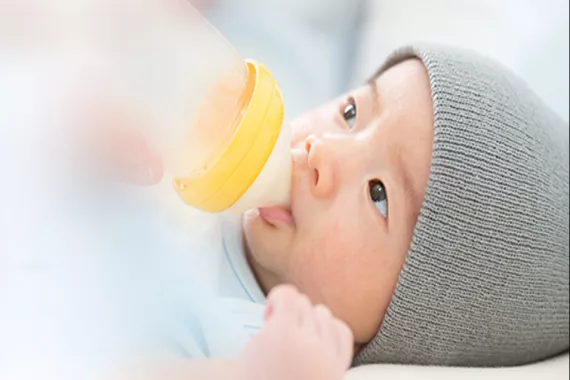 Baby drinking formula