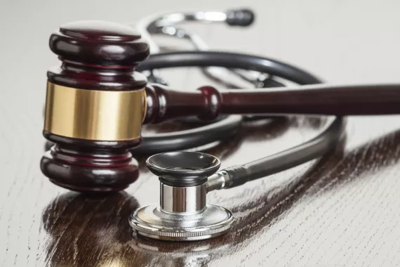Gavel next to stethoscope
