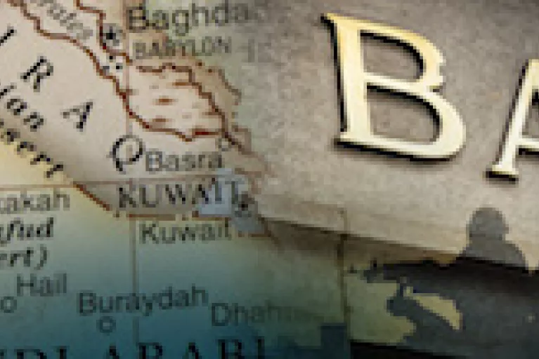 A map of Iraq and the surrounding areas overlayed with part of a bank sign.
