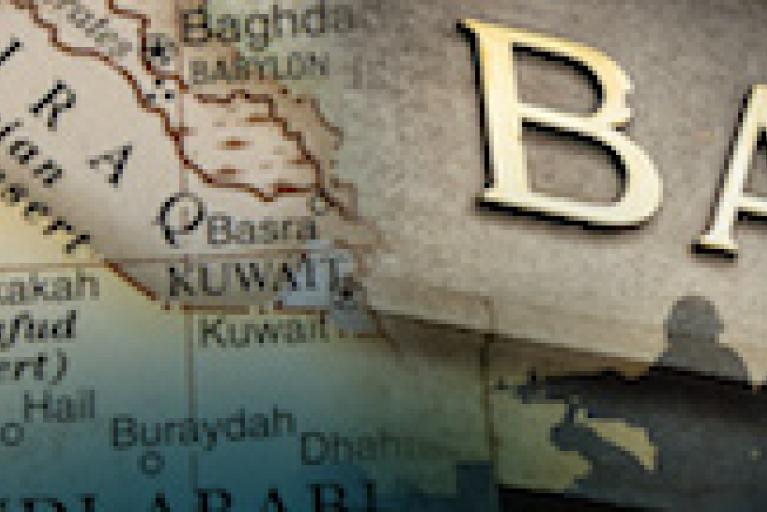 A map of Iraq and the surrounding areas overlayed with part of a bank sign.